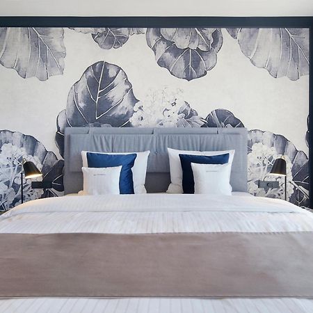 Das Tegernsee Bagian luar foto A bedroom at the hotel
